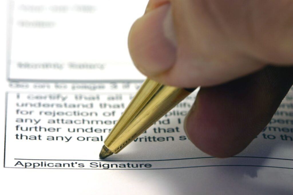 signing-a-grant